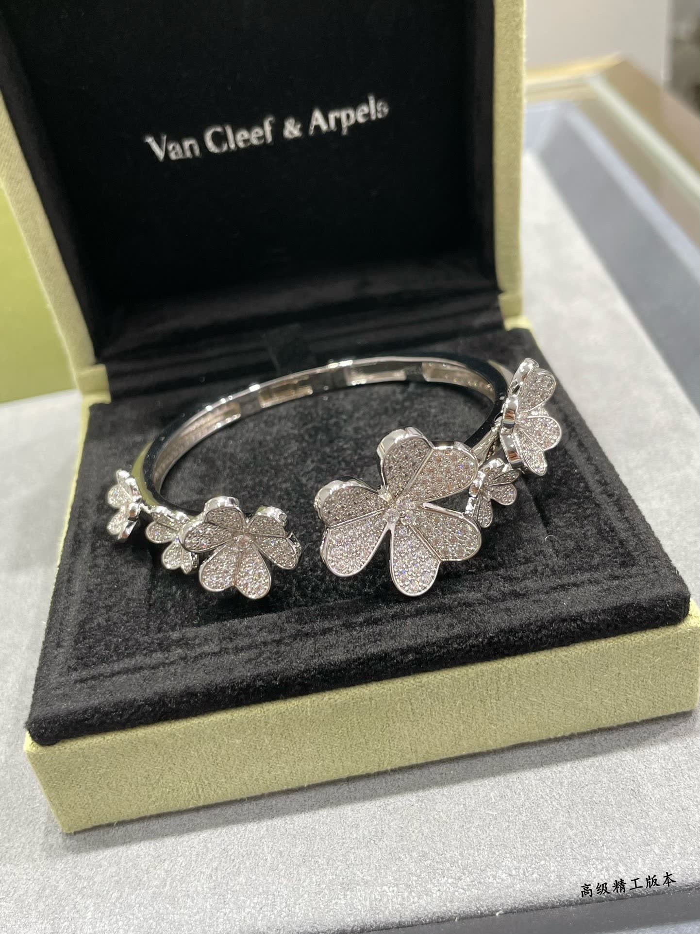 Van Cleef & Arpels Silver Flower Bracelet with Diamonds